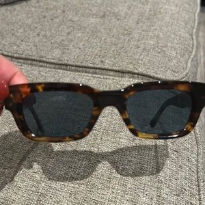 Akila sunglasses with blue lenses, tortoise colored
